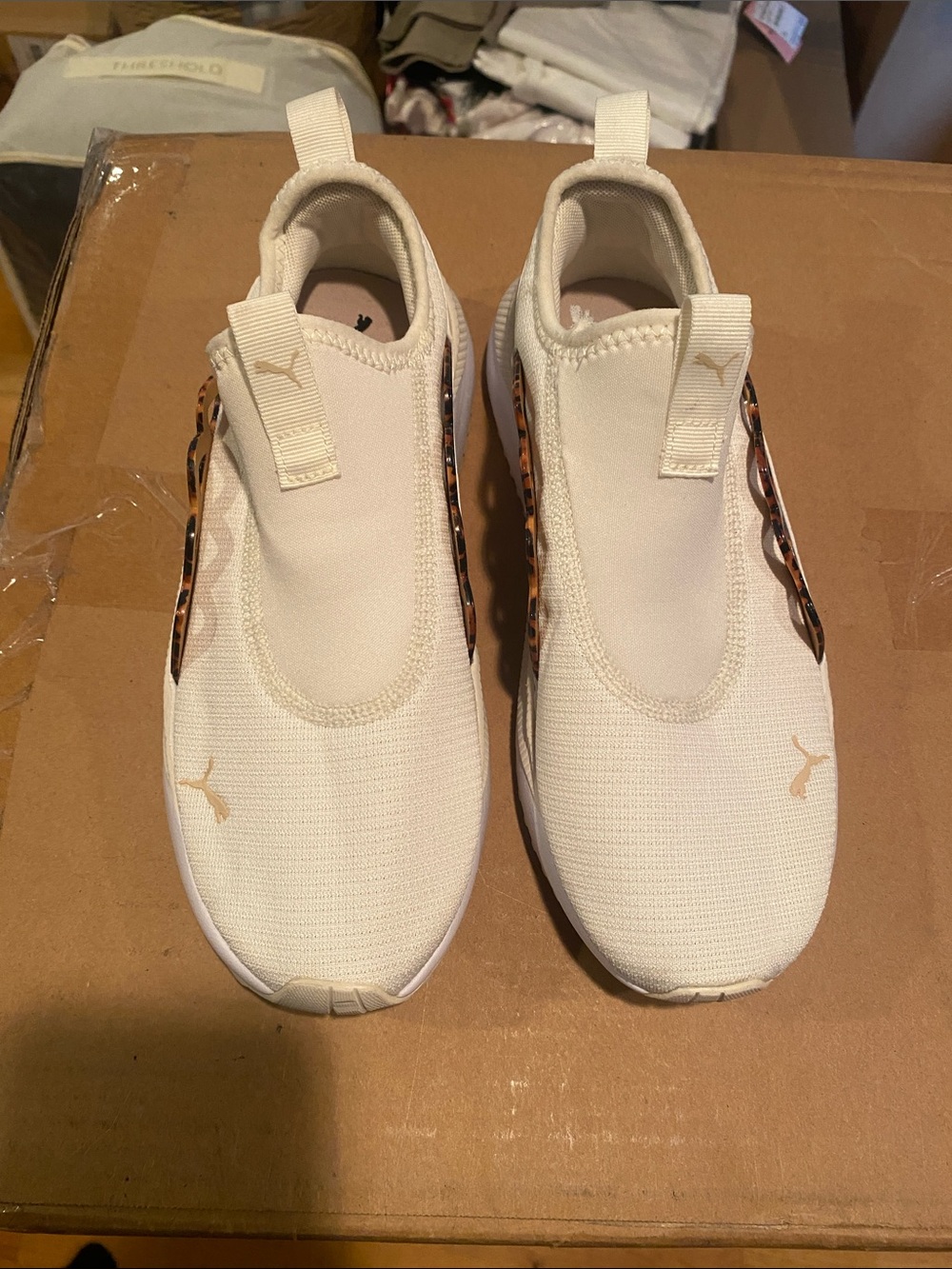Puma Cream Slip-On Sneakers with Leopard Trim.  No offers